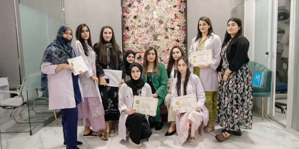 Alt Tag: Student performing a dermal filler injection under expert supervision at London Aesthetics Training Institute.